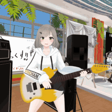 a girl holding a guitar with a sweatshirt that says vighan on it