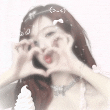 a girl making a heart shape with her hands with a swirl of whipped cream in the background