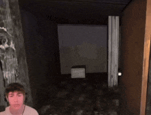 a man wearing headphones is standing in front of a door with a letter e on it .