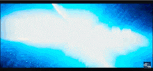 a blue background with a white cloud in the middle of it