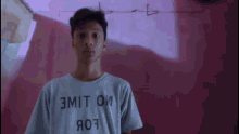 a blurry image of a person wearing sunglasses and a shirt that says ' star wars '