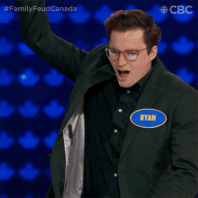 a man wearing a name tag that says ryan