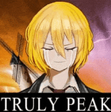 a man with yellow hair is crying in front of a windmill in a video game called truly peak .