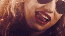 Woman Licking GIF - Woman Licking Gold Tooth GIFs