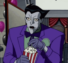joker eating popcorn nom