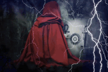 a person in a red cape with a lightning bolt behind them