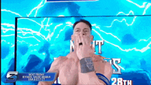 a man with a wristband that says ' wwe ' on it