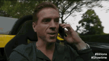 Driving While Talking GIF - Damian Lewis Bobby Axelrod Ferrari GIFs