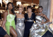 a group of women posing for a photo with muglife.com written on the bottom