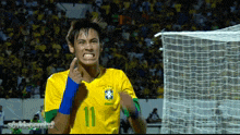 a soccer player with the number 11 on their jersey