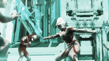 two superheros are fighting in front of a building with the word ultraman on the bottom left
