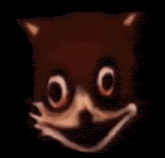 a close up of a cartoon character 's face with big eyes and a smile .