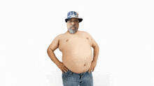 a man without a shirt is wearing a hat that says utg on it