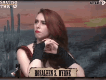 a woman named rosaleen s. byrne is sitting in front of a desert landscape