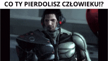 a picture of a man in a futuristic suit with the words " co ty pierdolisz czlowiku " below him
