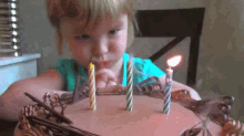kid cake child blow candle funny