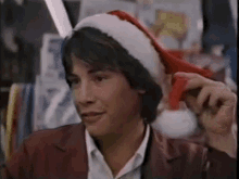 Keanu Reeves Santa GIF