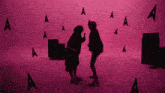 two people singing into microphones in front of a pink background with black letters aa