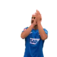 a man wearing a blue shirt with sap on it