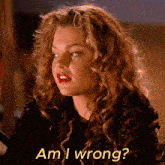 a woman with curly red hair is asking am i wrong