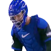 a baseball player wearing a helmet and a vest that says nike