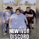 a group of men are standing next to each other in a park with a large fat man in the middle .