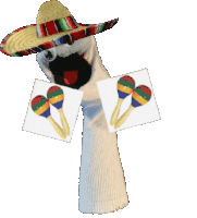 a puppet wearing a sombrero and holding maracas
