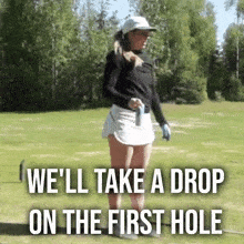 a woman is standing on a golf course with the words we 'll take a drop on the first hole