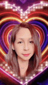 a woman 's face is framed by a heart shaped background