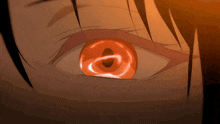 a close up of a person 's eye with a red eyeball