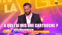 a man with a beard is on a television show and says a qui j'ai mis une cartouche ?