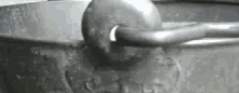 a close up of a pot with a spoon in it .