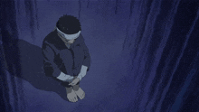 a person with a bandage on their head is kneeling down