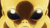 a close up of a cartoon character 's face with large eyes
