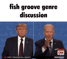 donald trump and joe biden are standing next to each other at a cnn presidential debate ..