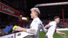 a soccer player with the number 3 on his back