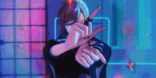 a person is holding a knife in front of their face and making a peace sign with their hands .