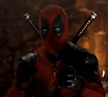 deadpool is pointing at the camera with the words kill this man with hammers on the bottom