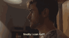 a man in a leopard print shirt is smiling and saying finally i can fart .