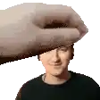 a hand is holding a man 's head in a pixel art .