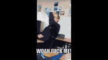 a man sitting in a classroom with the words woah fuck me