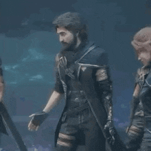 a man and a woman are standing next to each other in a dark room in a video game .