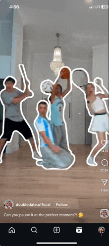 a phone screen shows a video of people playing sports