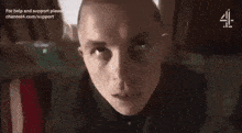 a close up of a man 's face with the words " take the black pill and realise "