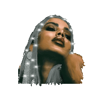 a close up of a woman 's face with sparkles in her hair