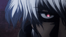 a close up of a person with red eyes