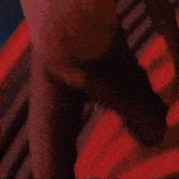 a man is doing a handstand in the air with his arms outstretched