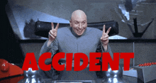 a bald man giving a peace sign with the word accident behind him