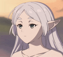 a girl with long white hair and elf ears looks at the camera