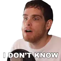 a man with a beard says i don 't know in front of a microphone